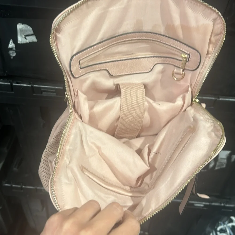 Blush perforated backpack